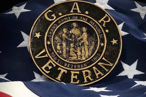 GAR Veteran marker displayed on an American flag background
