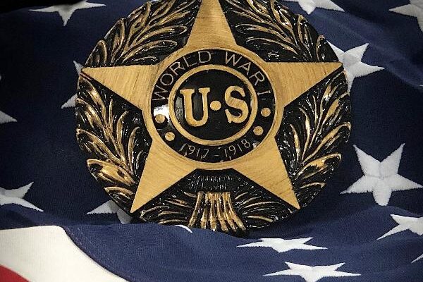 World War I U.S. Veteran marker displayed on an American flag background