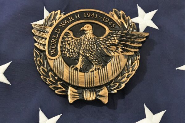 World War II 1941-1945 U.S. Veteran eagle marker displayed on an American flag background