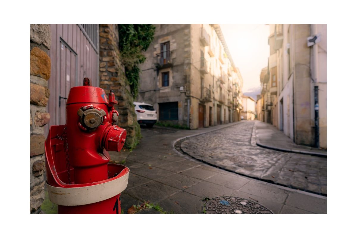 European Fire Hydrant on Sidewalk in Onati City, Spain.